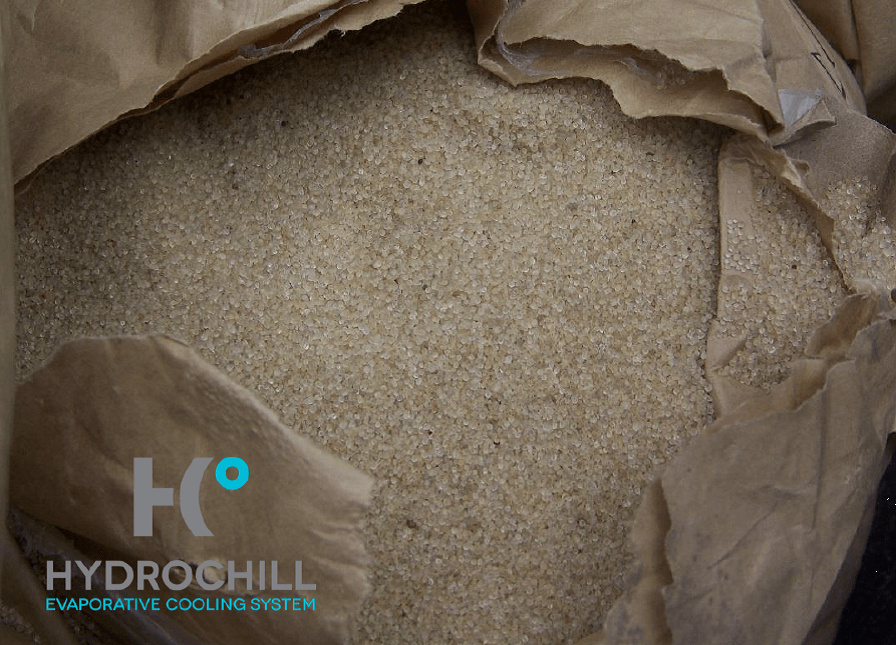 Bagged cooling infill sand for synthetic turf installation, designed to enhance evaporative cooling performance and reduce surface temperatures on artificial grass systems.